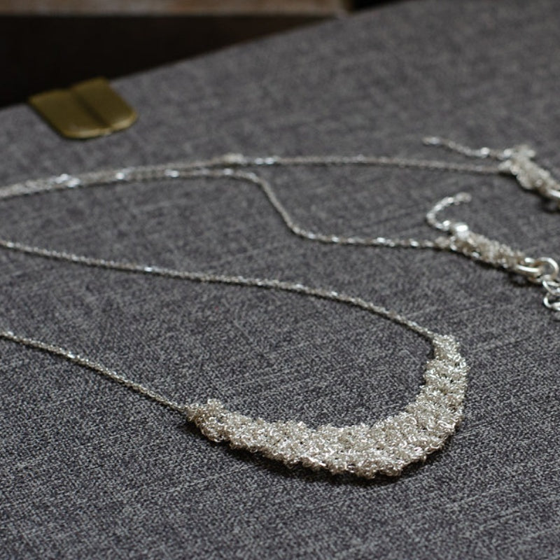Jzora handmade clear and crystalline moon-shape sterling silver necklace
