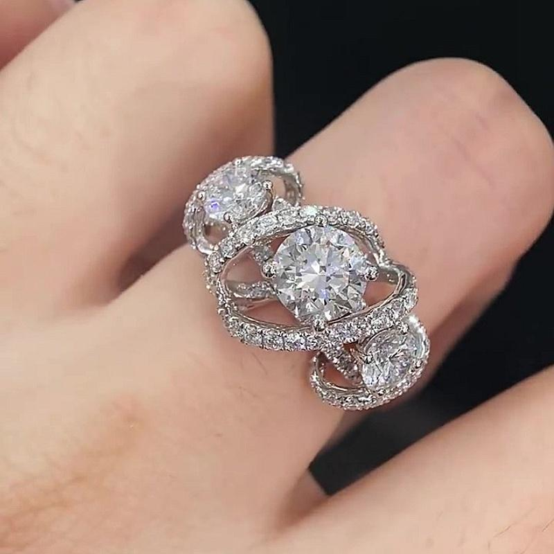 Jzora handmade round cut triple-stone Moissanite crisscross pavé halo ring