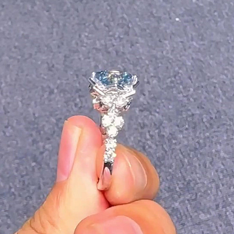 Jzora handmade sparkling aqua blue & white stone floral halo sterling silver ring