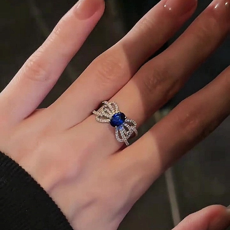 Jzora handmade feminine ribbon-inspired sapphire-tone bow pavé statement ring