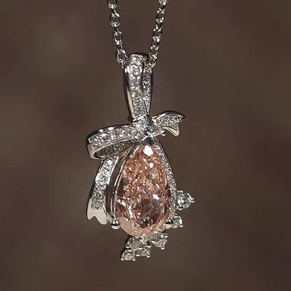 Jzora Handmade Bow Accent Pear Champagne Pink CZ Halo Women’s Drop Necklace