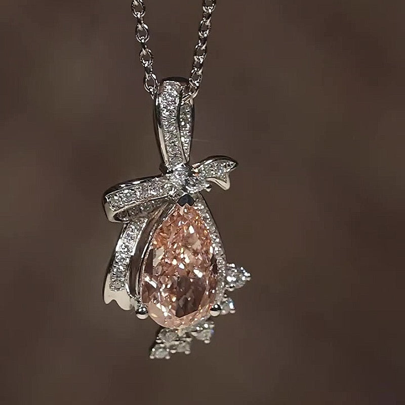 Jzora Handmade Bow Accent Pear Champagne Pink CZ Halo Women’s Drop Necklace
