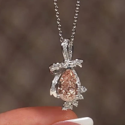 Jzora Handmade Bow Accent Pear Champagne Pink CZ Halo Women’s Drop Necklace