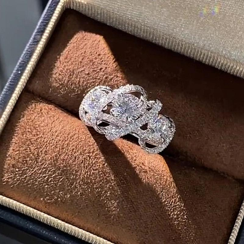 Jzora handmade round cut triple-stone Moissanite crisscross pavé halo ring