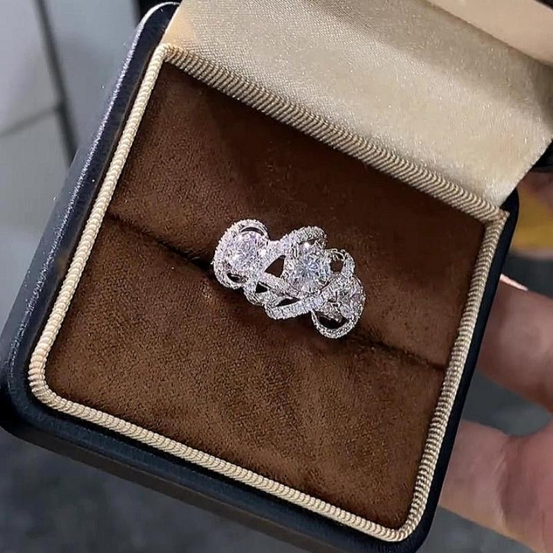 Jzora handmade round cut triple-stone Moissanite crisscross pavé halo ring