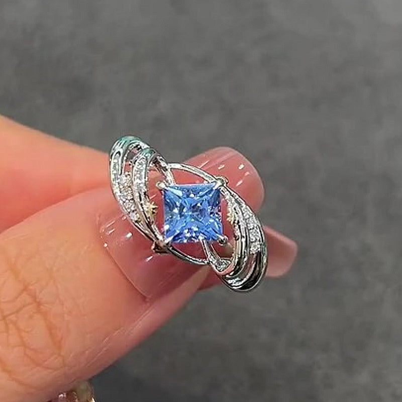 Jzora Handmade Princess Cut Blue Topaz Twisted Vine Design Sterling Silver Ring