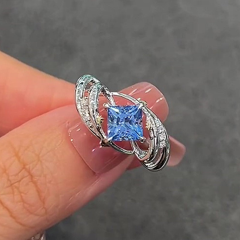 Jzora Handmade Princess Cut Blue Topaz Twisted Vine Design Sterling Silver Ring