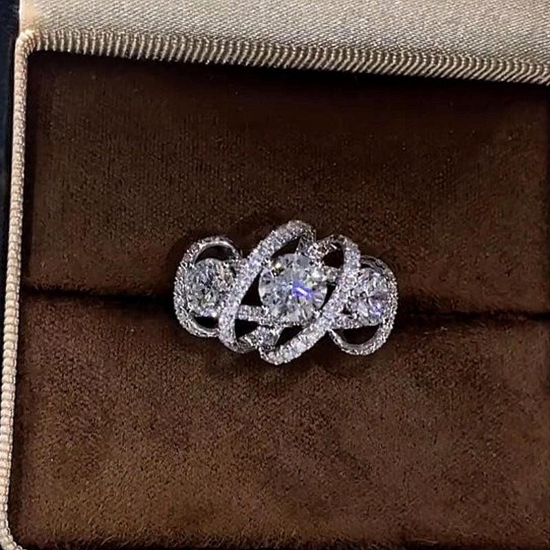 Jzora handmade round cut triple-stone Moissanite crisscross pavé halo ring